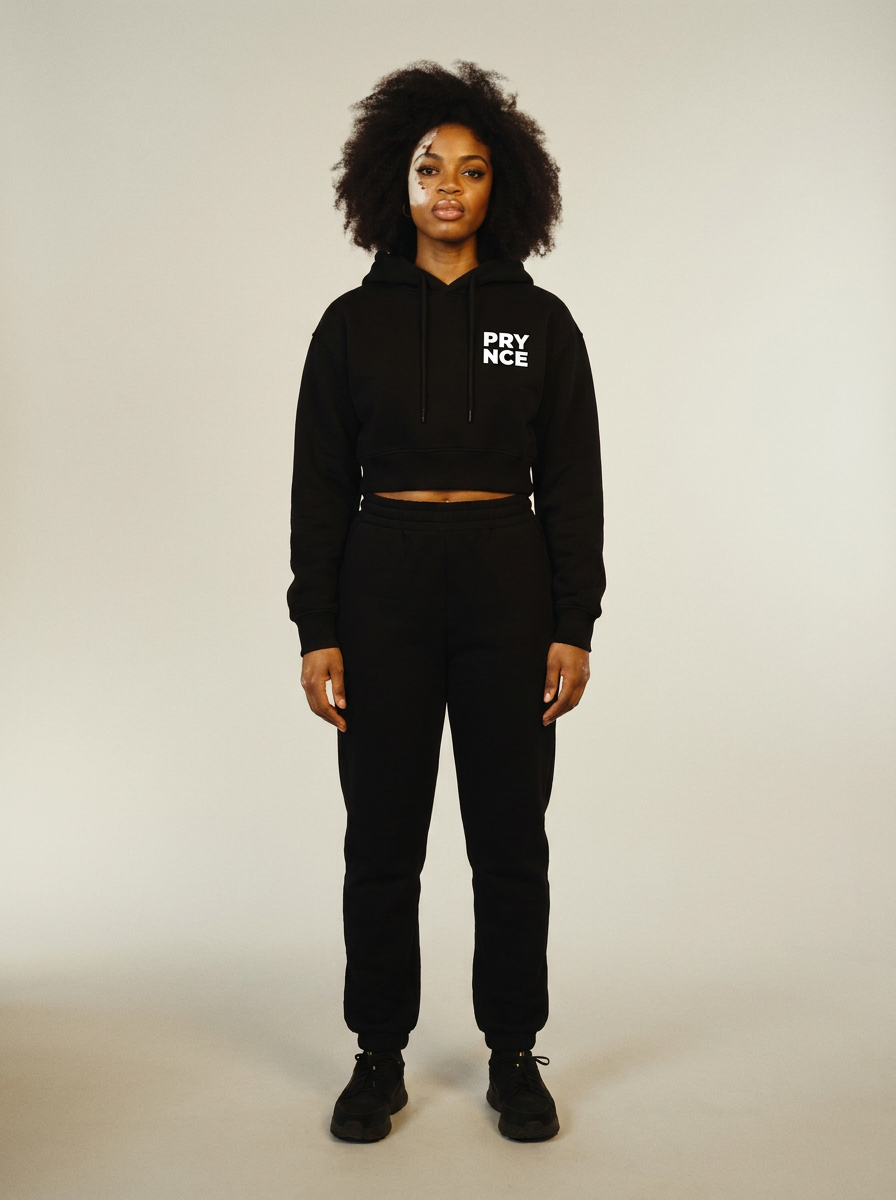 Model wearing the Prynce Essential Cropped Hoodie with matching joggers, studio catalog photo