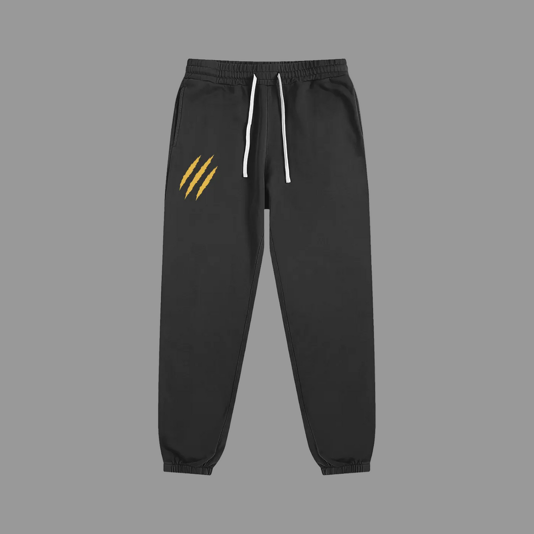 PRYNCE Claw Marks Sweatpants in black, front view with small gold claw marks on the upper leg and white drawstrings