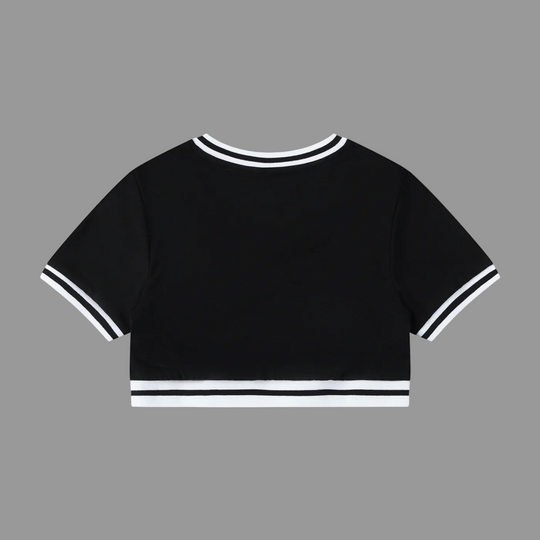 Black crop top with white trim on a white background