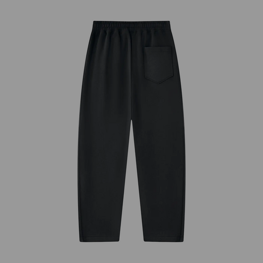Black wide-leg sweatpants with an elastic waistband and a single patch pocket on the left side, shown against a plain white background.