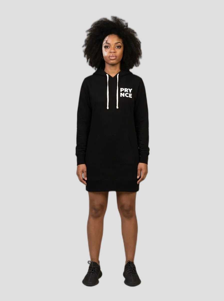 Model wearing the Prynce Hooded Pullover Dress, studio catalog photo