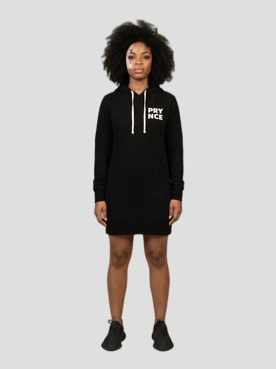 Model wearing the Prynce Hooded Pullover Dress, studio catalog photo