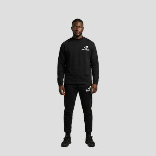 Man wearing the PRYNCE Athletics Mockneck Long Sleeve in black with small white chest logo, with black pants