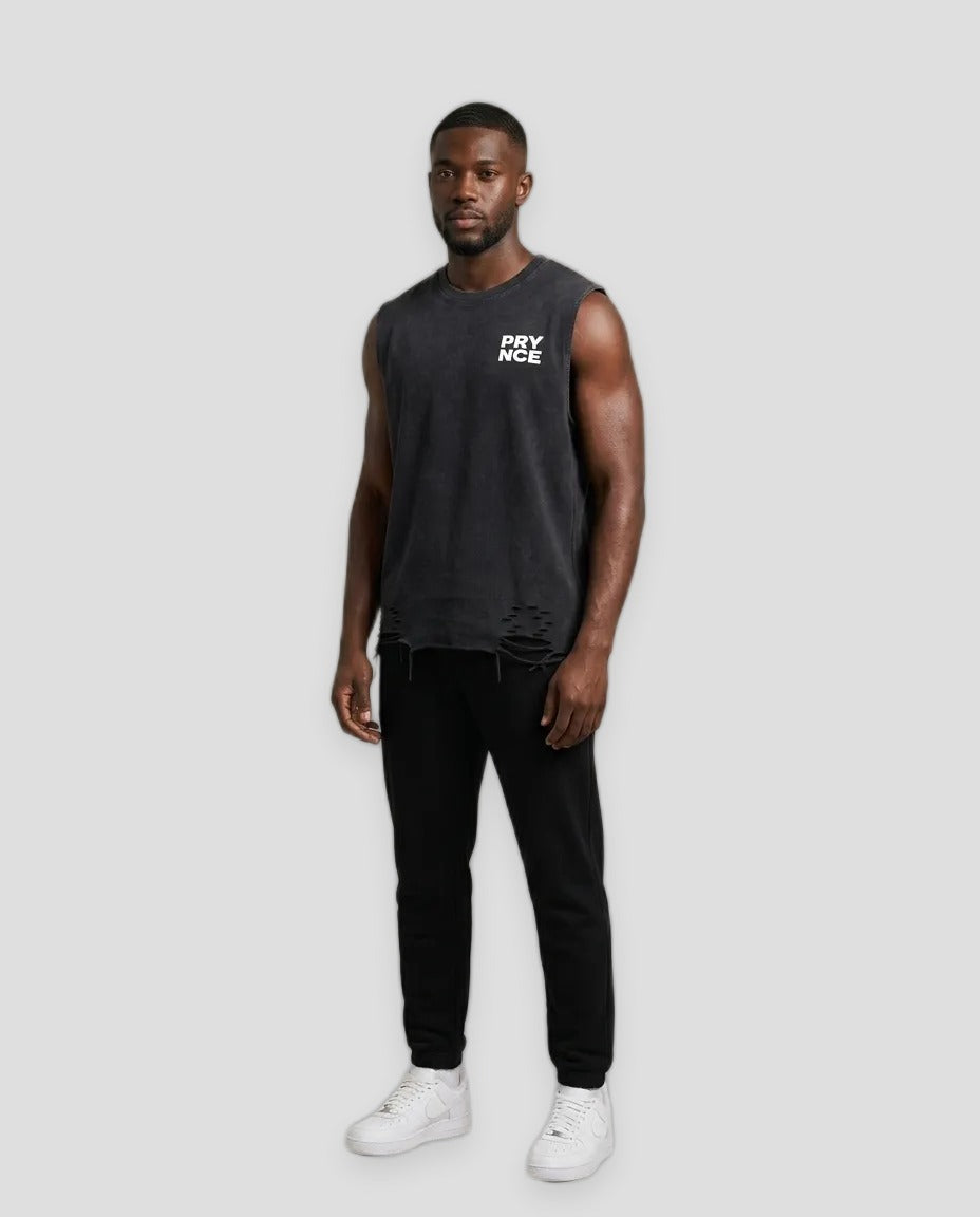 A man modeling a dark charcoal gray sleeveless t-shirt with a white &
