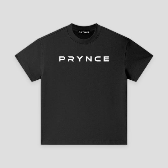 Black t-shirt with mountain graphic on a grey background