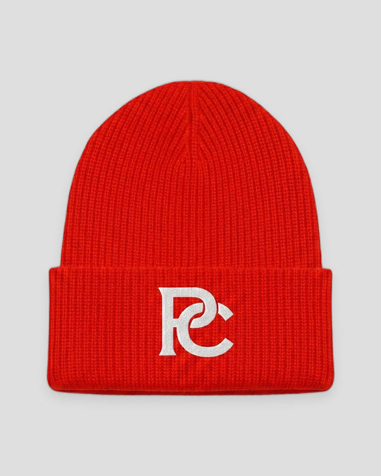 PC Signature Knit Beanie in red with a white interlocked PC monogram on the cuff