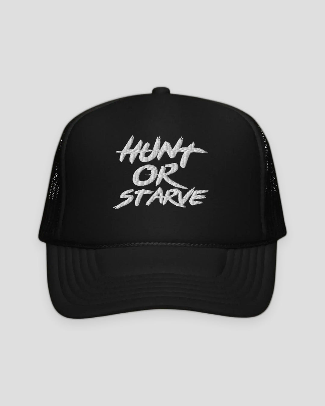 Black trucker cap with 'Hunt or Starve' text on a white background