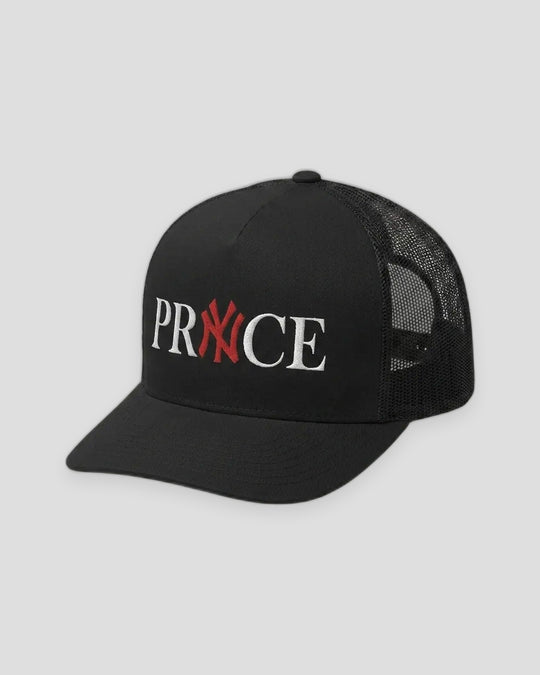NY PRYNCE Trucker Hat in black, side front view — PRYNCE embroidered in white with a red X, black mesh back