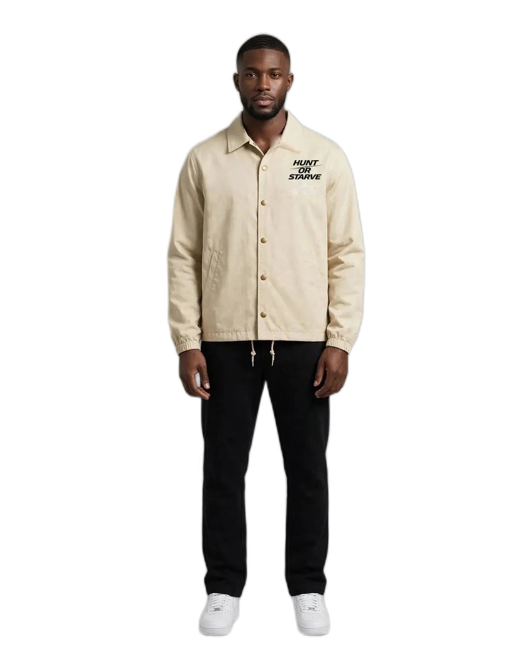 Man wearing the Hunt or Starve Coaches Jacket in beige, front view with small chest logo