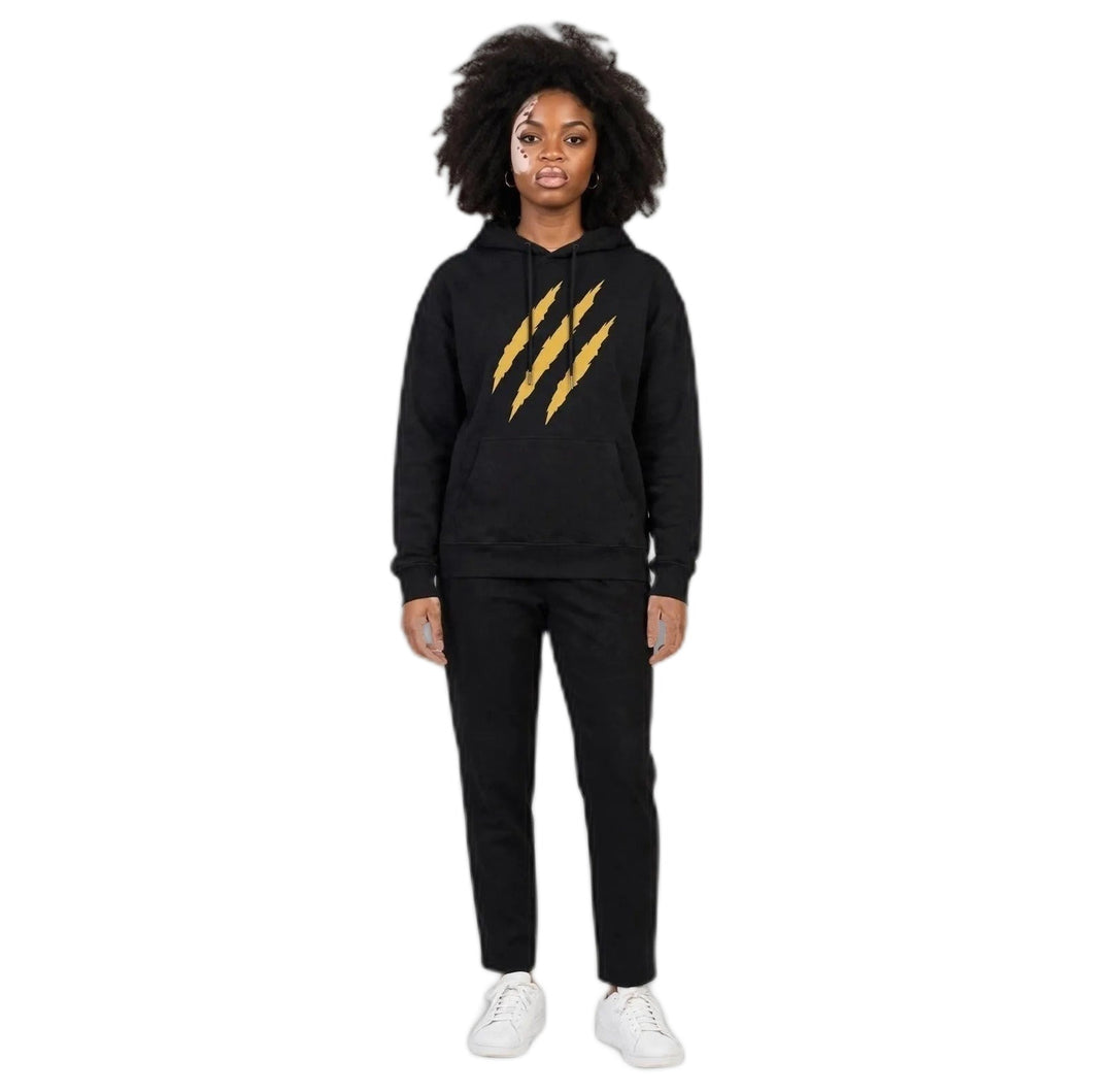 Camila wearing the PRYNCE Claw Marks Hoodie in black with gold claw marks on the chest, full body