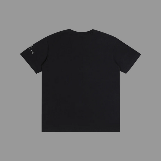 Black t-shirt on a grey background