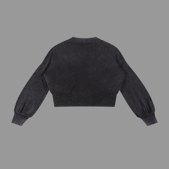 Black sweater with balloon sleeves on a white background