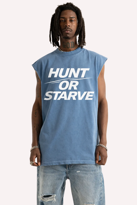 Person wearing a blue sleeveless shirt with &