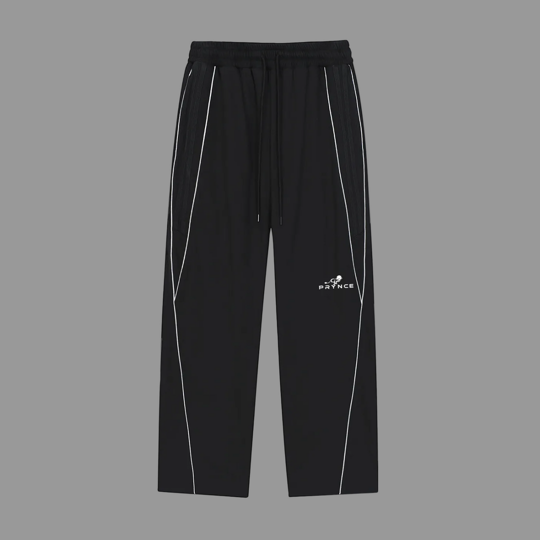 Black athletic pants with white side piping and a white printed logo on the left leg, shown against a plain white background.