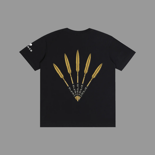 A black short-sleeve t-shirt shown flat against a white background, featuring a graphic of five gold darts on the back with the brand name &