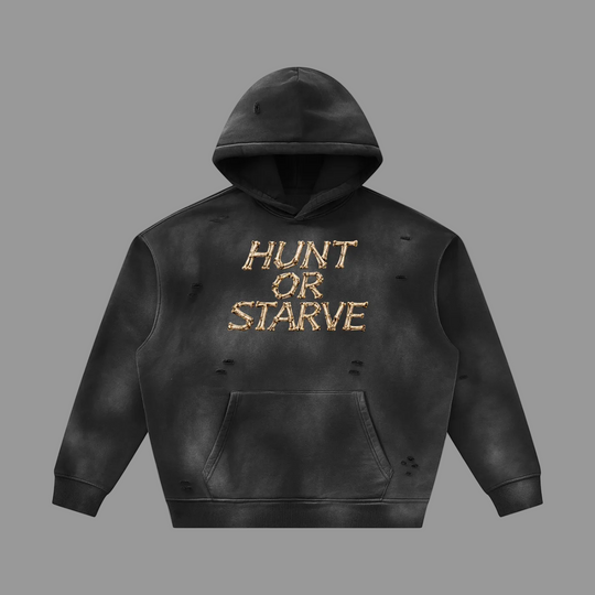 A black distressed hoodie with a white &