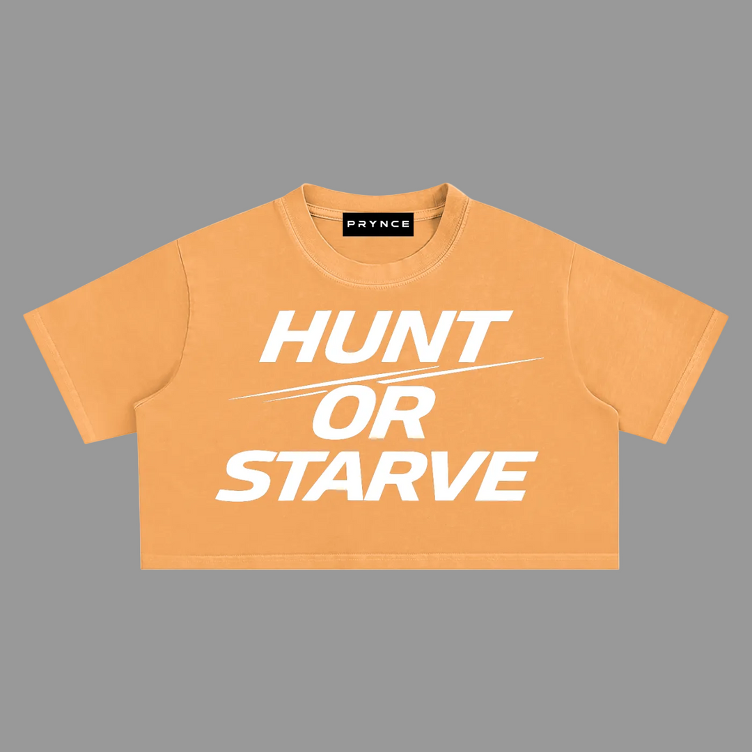 A cropped short-sleeve t-shirt in a warm orange color with the bold white text &