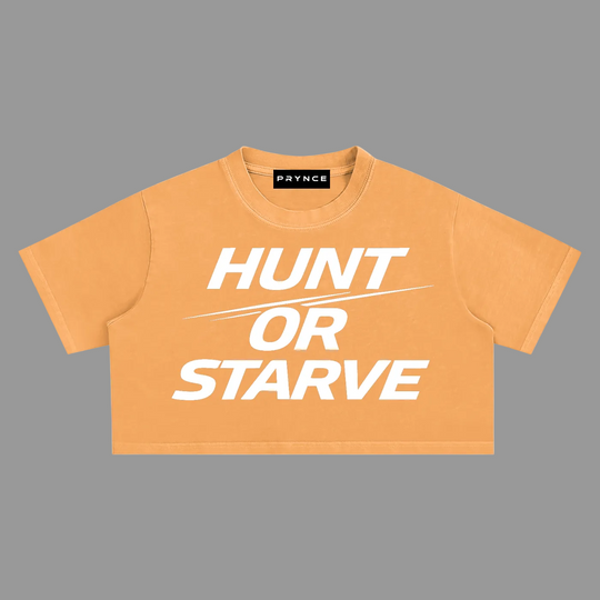 A cropped short-sleeve t-shirt in a warm orange color with the bold white text &