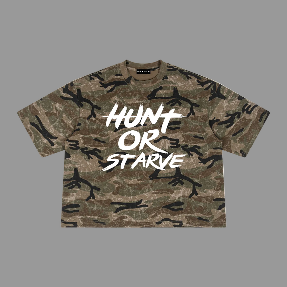 A short-sleeve camouflage t-shirt with a bold white graphic text reading 'HUNT OR STARVE' across the chest, displayed flat against a solid white background.