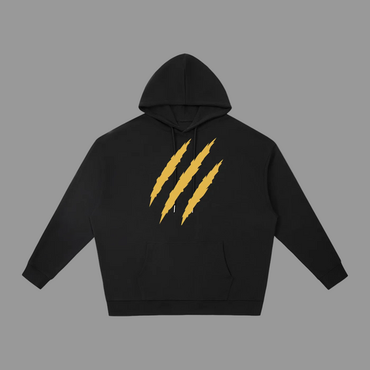 A black pullover hoodie with a graphic of four yellow claw marks on the chest, displayed against a solid white background.