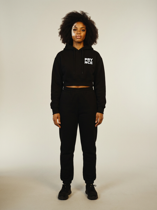 Model wearing the Prynce Essential Cropped Hoodie with matching joggers, studio catalog photo