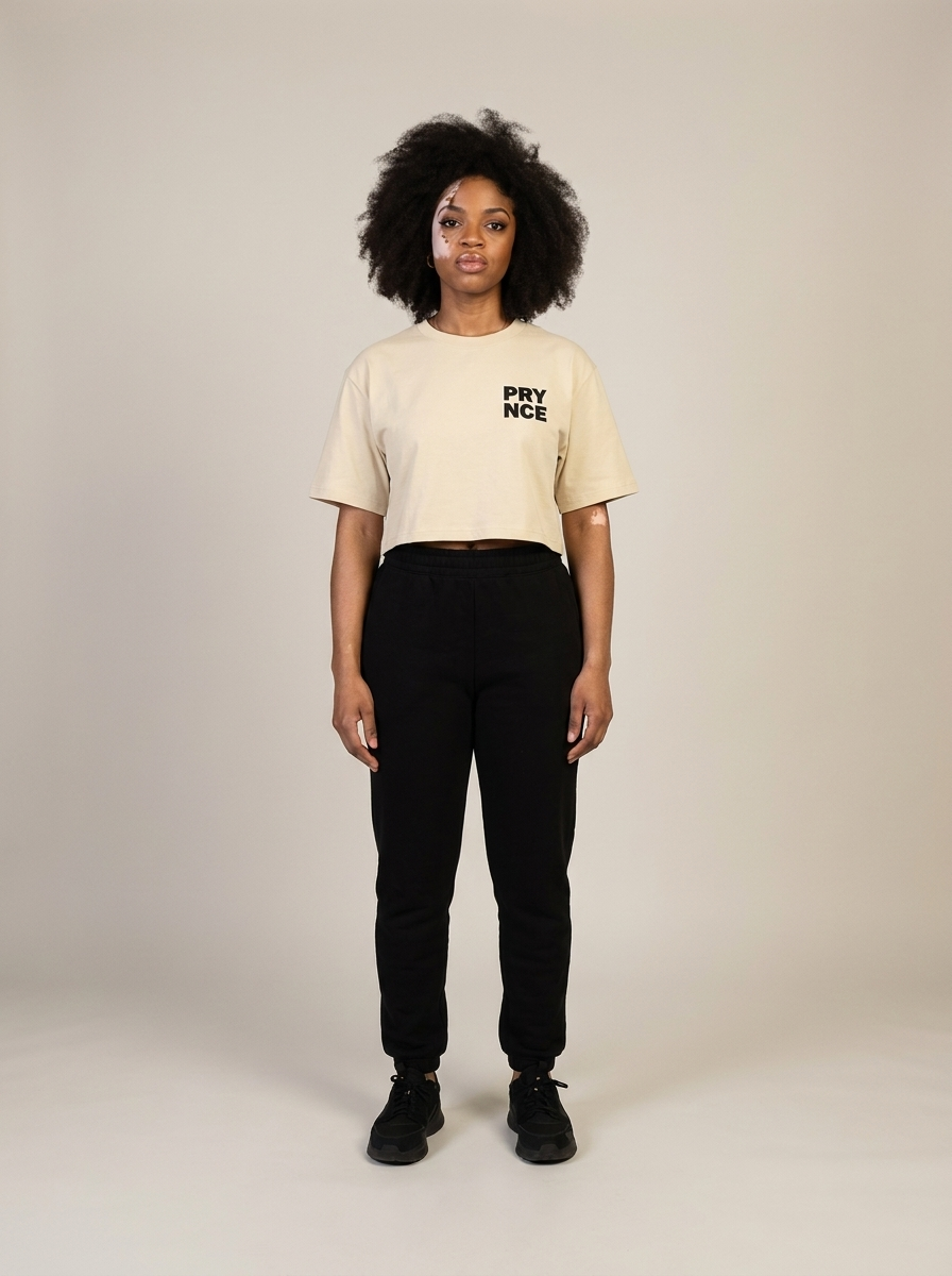 Model wearing the Prynce Crop Tee with high-waisted joggers, studio catalog photo