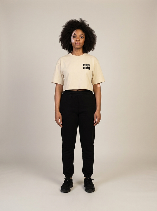 Model wearing the Prynce Crop Tee with high-waisted joggers, studio catalog photo