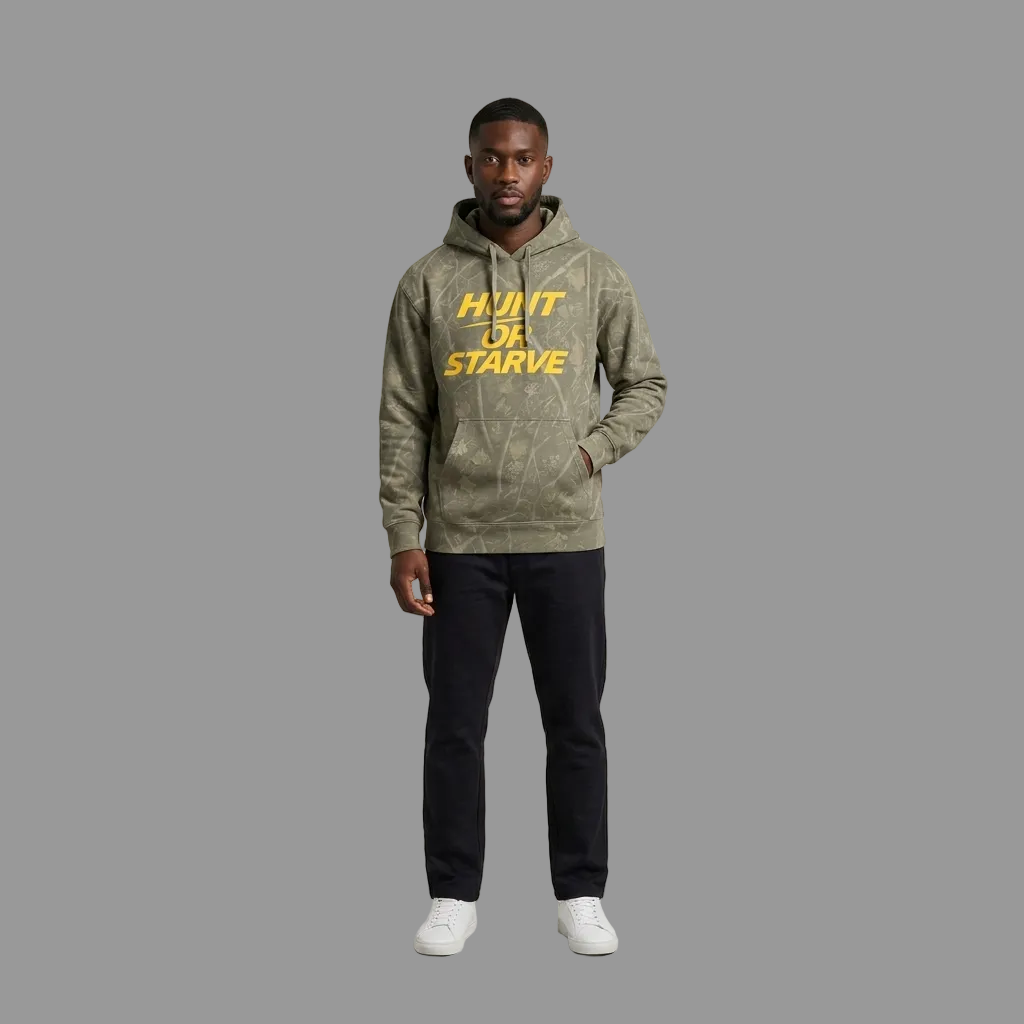 Model wearing the Hunt or Starve Heavyweight Hoodie in Deadwood Camo, PRYNCE studio catalog tile