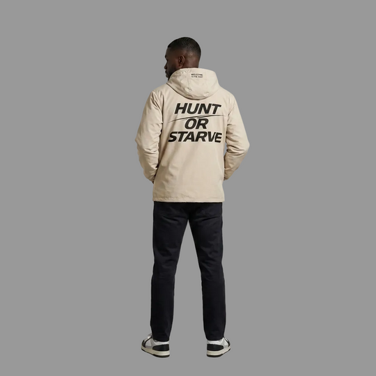 Model wearing the PRYNCE Hunt or Starve Coaches Jacket showing the back print, PRYNCE studio catalog tile