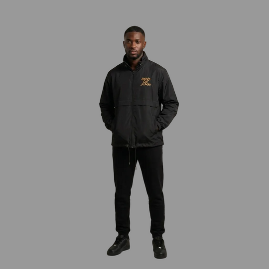 Model wearing the Hunt or Starve Windbreaker in black, PRYNCE studio catalog tile