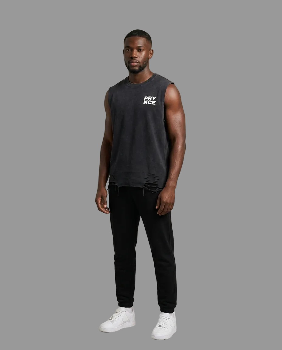 A man modeling a dark charcoal gray sleeveless t-shirt with a white &