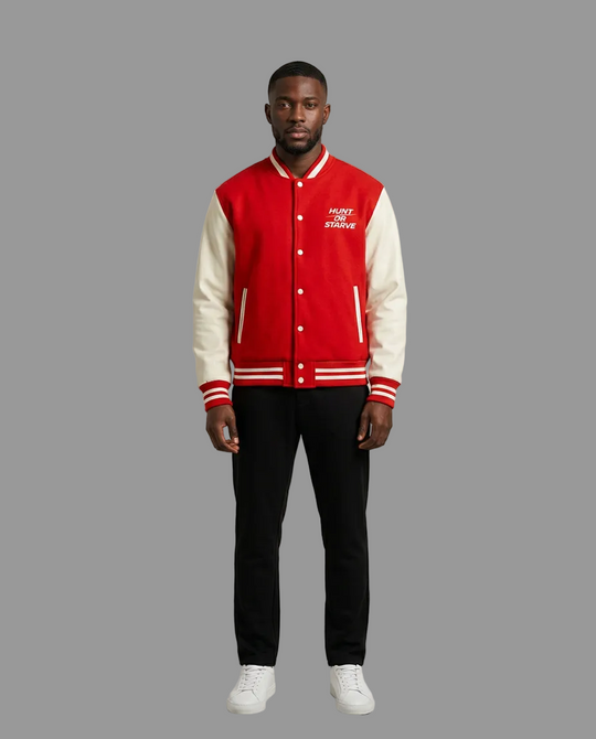 A man wearing a red and cream varsity jacket with &