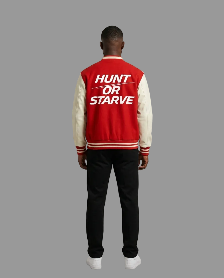 A man viewed from behind wearing a red and cream varsity jacket with the text &