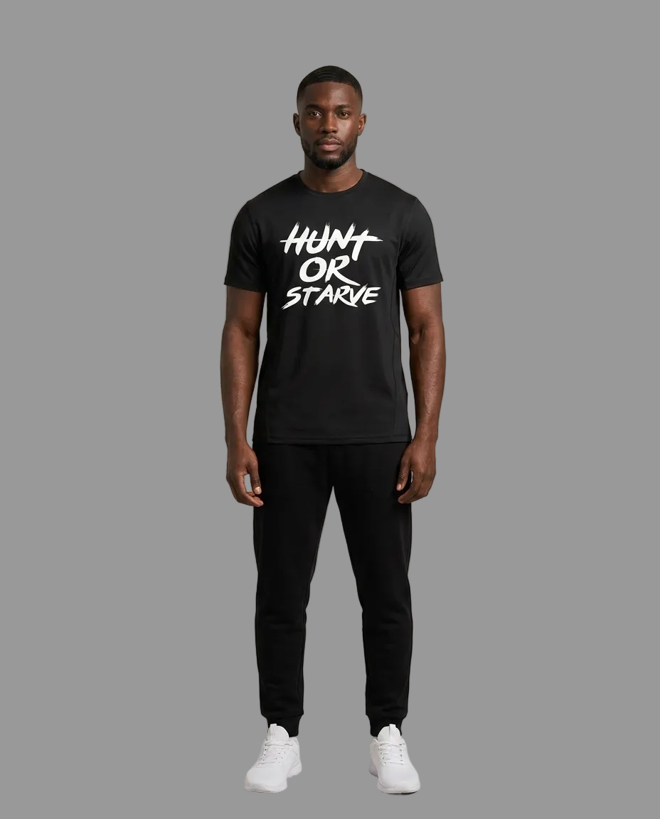 A man modeling a black short-sleeve t-shirt with a white graphic text print that reads &