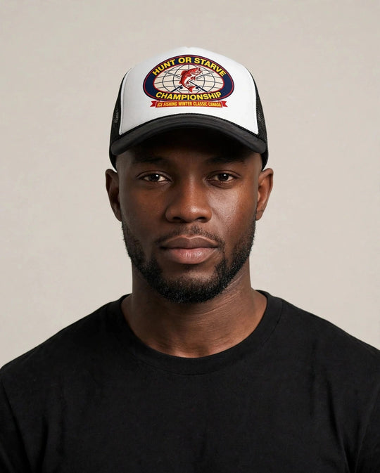 Chris wearing the Hunt or Starve Championship Foam Trucker Hat — black and white foam trucker with HUNT OR STARVE CHAMPIONSHIP ice fishing badge print
