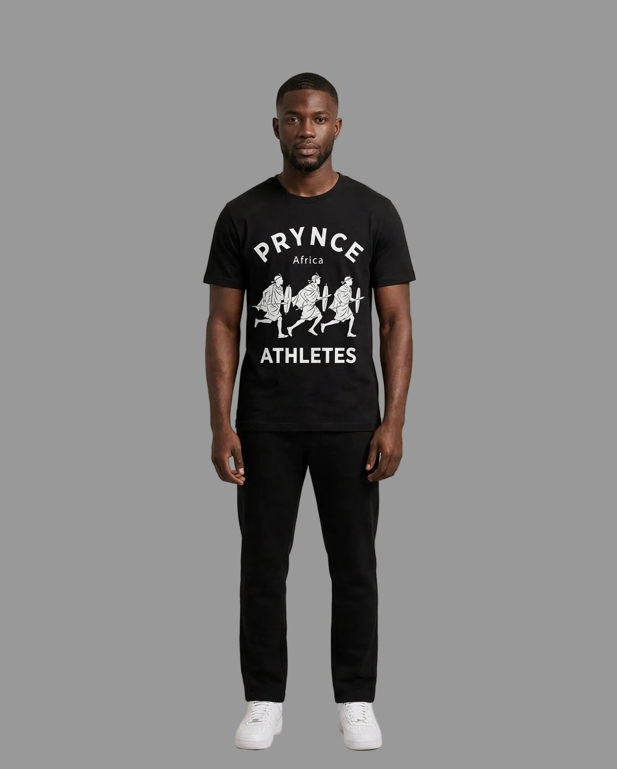 Man wearing the PRYNCE Maasai Africa Athletes Tee in black with white Maasai warriors print