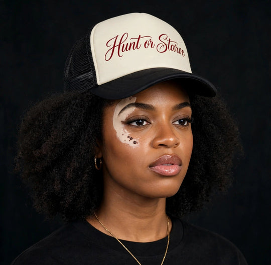 Camila wearing the Hunt or Starve Script Foam Trucker Hat — foam trucker hat with HUNT OR STARVE script print